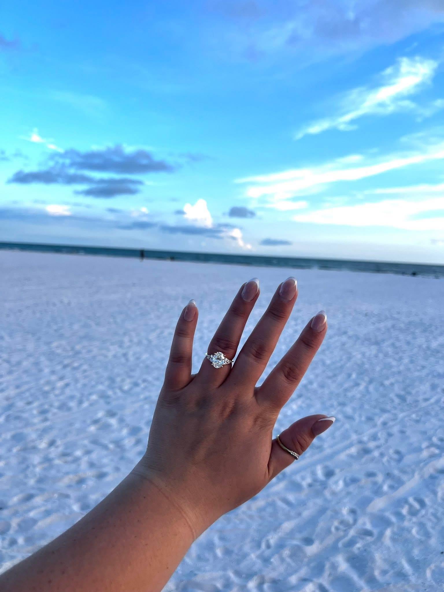 Engagement ring worn on a beach