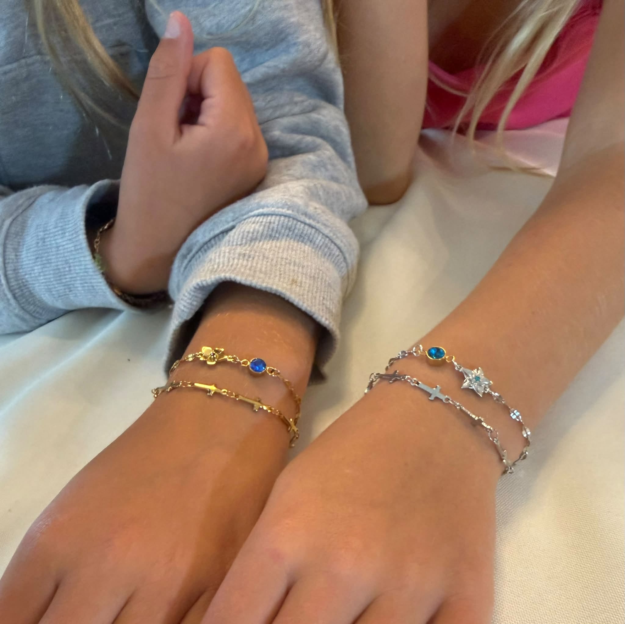 Friends wearing permanent bracelets